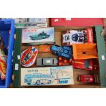 Box of assorted vintage toys including tinplate battery operated Big Machine racing car, Triang,