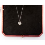 Cartier, a diamond set 18ct white gold heart pendant and chain,