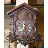 A 20th Century small sized wall hanging cuckoo clock