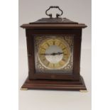 A beech mantle clock with Seiko movement,