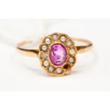 A pink tourmaline and seed pearl cluster ring