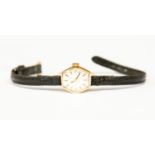 A Caravelle 9ct gold ladies watch,