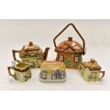 Staffordshire Pottery tea set with biscuit barrel and butter dish in cottage style