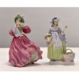 Two Royal Doulton female figures,