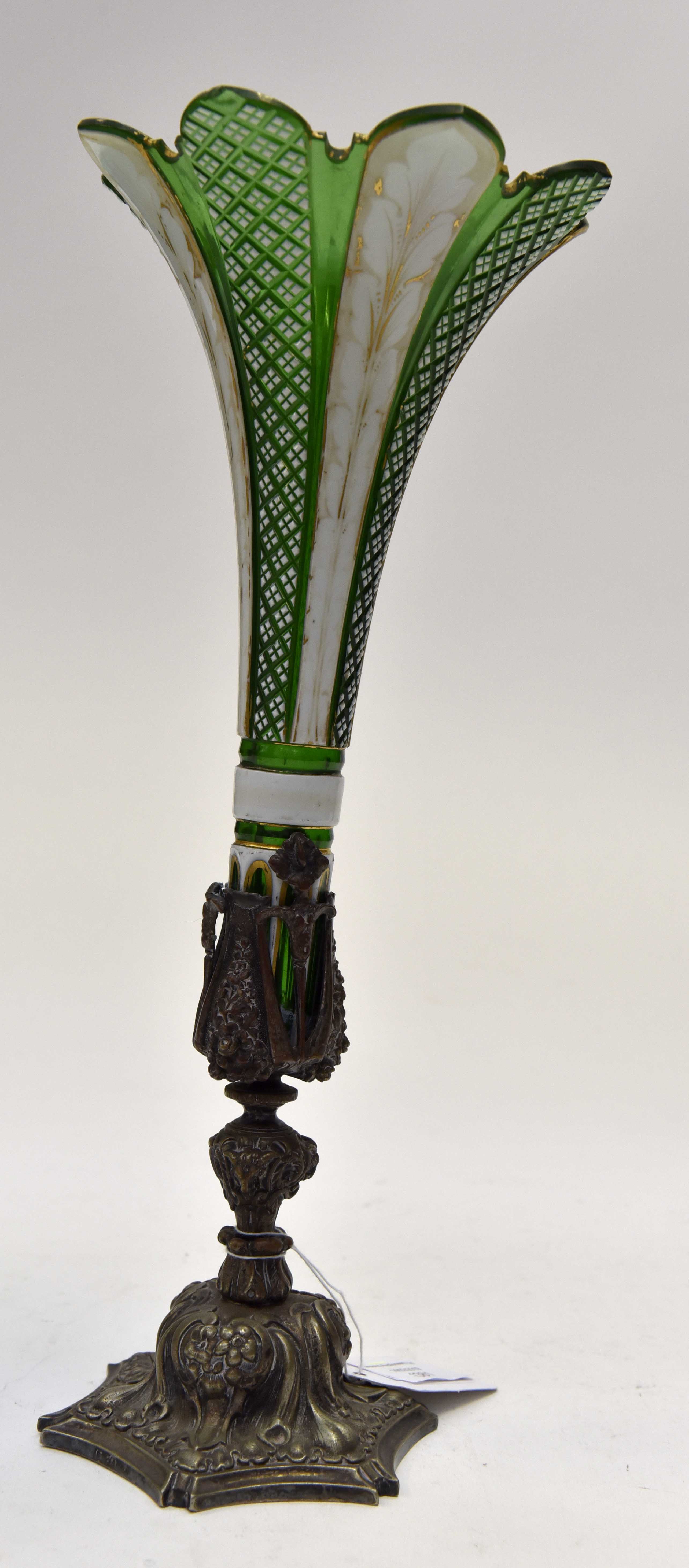 A 19th Bohemian green and white over laid glass epergne, of fluted form,