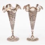 Pair of Burmese silver, fluted spill vase in relief 13.