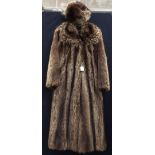 A Canadian racoon fur coat 1976 with matching hat full length, medium size, as new,