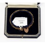 A 9ct gold gate link bracelet with locket clasp