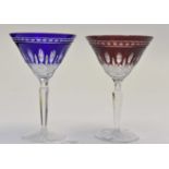 Two Waterford crystal cut glass ruby and Bristol Blue champagne glasses (2)