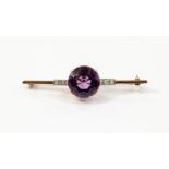An amethyst and diamond set 18ct gold bar brooch, the central amethyst approximately 16mm diameter,