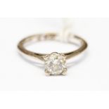 A diamond solitaire ring, claw set brilliant cut diamond weighting approx 1ct, assessed clarity I1,