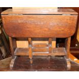 A small sized 20th Century oak drop leaf table, 43cm high, 50cm wide,