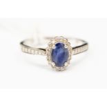 A sapphire and diamond cluster ring,