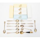 Ten silver 830 grade filigree handled teaspoons and a knife; gross silver weight 5.