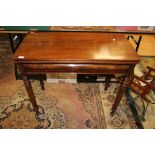 An early Victorian mahogany tea table,