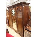 A late Victorian mahogany bedroom suite