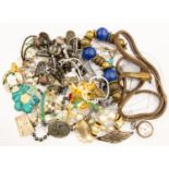 A collection of costume jewellery to include silver pendants, brooches and a amber set bracelet,