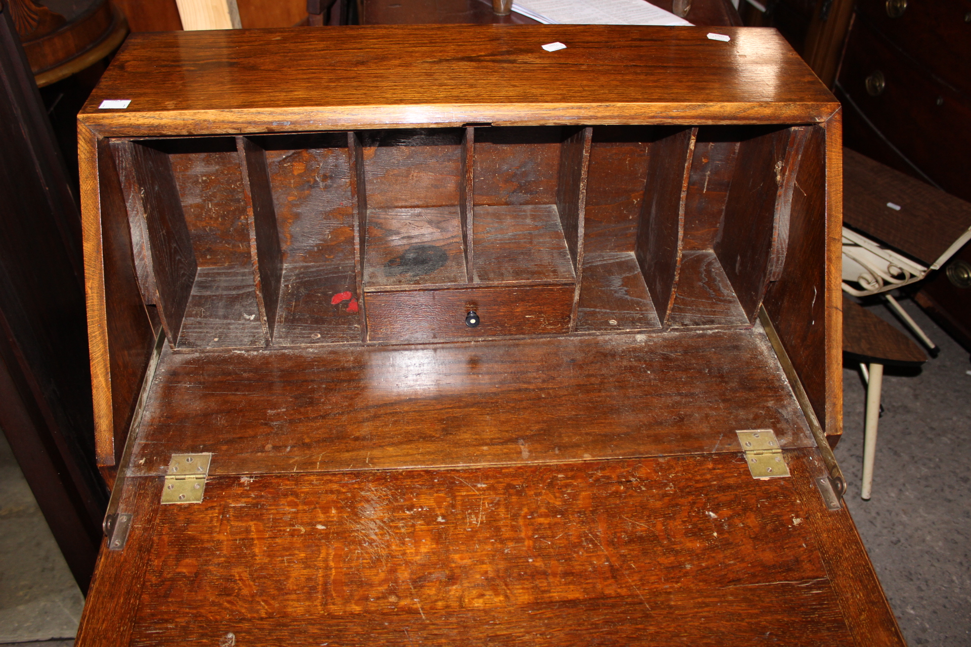 A George V oak bureau, the fall enclosing a fitted interior, - Image 2 of 2