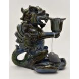 Candle holder in the form of a Dragon a/f,