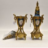 Pair of French 19th Century Ormalu twin handled garnitures and covers with blue porcelain panels