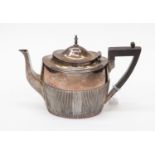 An Edwardian silver oval teapot, James Dixon,