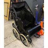 A Victorian style Royal Court upright baby carriage,