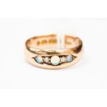 An opal and diamond ring, 9ct gold mount set with three opals with two diamond accents, size M,