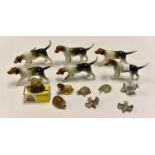 Six Beswick style model of hounds together with Wade Whimsies; a lion,