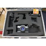1 metal camera flight case containing a canon AE-1 camera with lenses