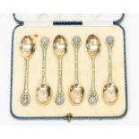 A set of six George V silver-gilt and enamel teaspoons,