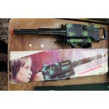 Battery operated Triple Action machine gun, boxed,