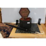 Early 20th Century black parasol and 20th Century squeeze box in case (AF)