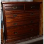 A late Victorian Aesthetic style mahogany chest of drawers,