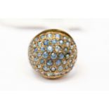 A 14ct gold sapphire set boule ring, pave set with round sapphires, head size approx 16mm,