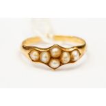 A good pearl set yellow metal ring, size M 1/2, gross weight approx 1.
