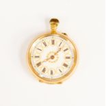 A 18k gold pocket watch, enamel dial, gilt decoration, Roman numerals, gold detail to dial,