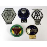 Five car badges, including AA, Alvis, Riley,