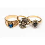 Two 9 ct gold rings and a silver gilt ring (3)
