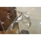 A set of three Canadian Hoselton aluminium sculptures (3)