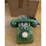 A Plessy dark green 1960's telephone, in working order, unusual colour,
