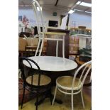 A white marble topped circular bar table,