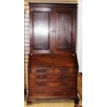 A George III mahogany bureau bookcase,