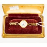 A Summit ladies 9ct gold vintage watch, octagonal dial, numbers and subsidiary dial,