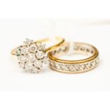 A diamond cluster ring and an eternity ring (2)