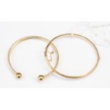 Two 9ct gold bangles