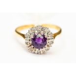 An amethyst and diamond round cluster ring, 18ct gold mount, size M,