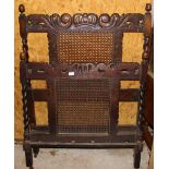 An early 20th Century Jacobean style oak single bedstead