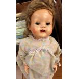 A hard plastic doll possibly Rosebud,