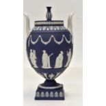Dark blue Wedgwood twin handles urn and cover (1) Condition: Finial off and restored Approx Size: