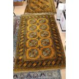 Two Iron rust navy blue coloured hand knotted woollen rugs,
